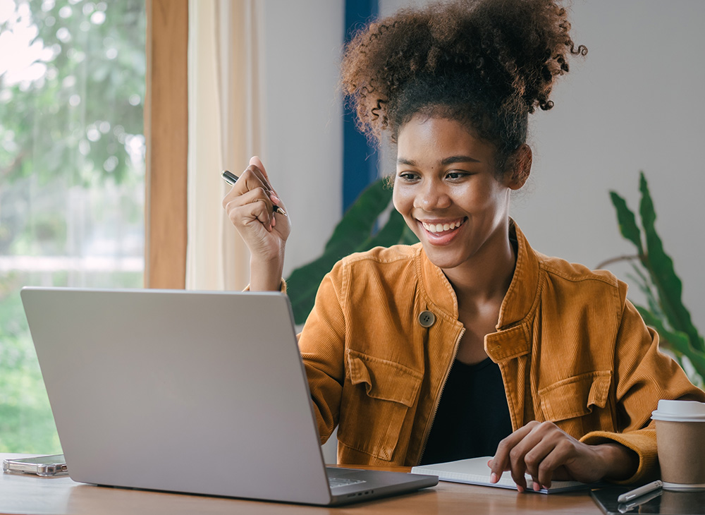Teen girl taking Start on laptop